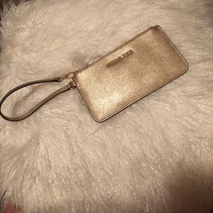 Michael Kors gold wristlet